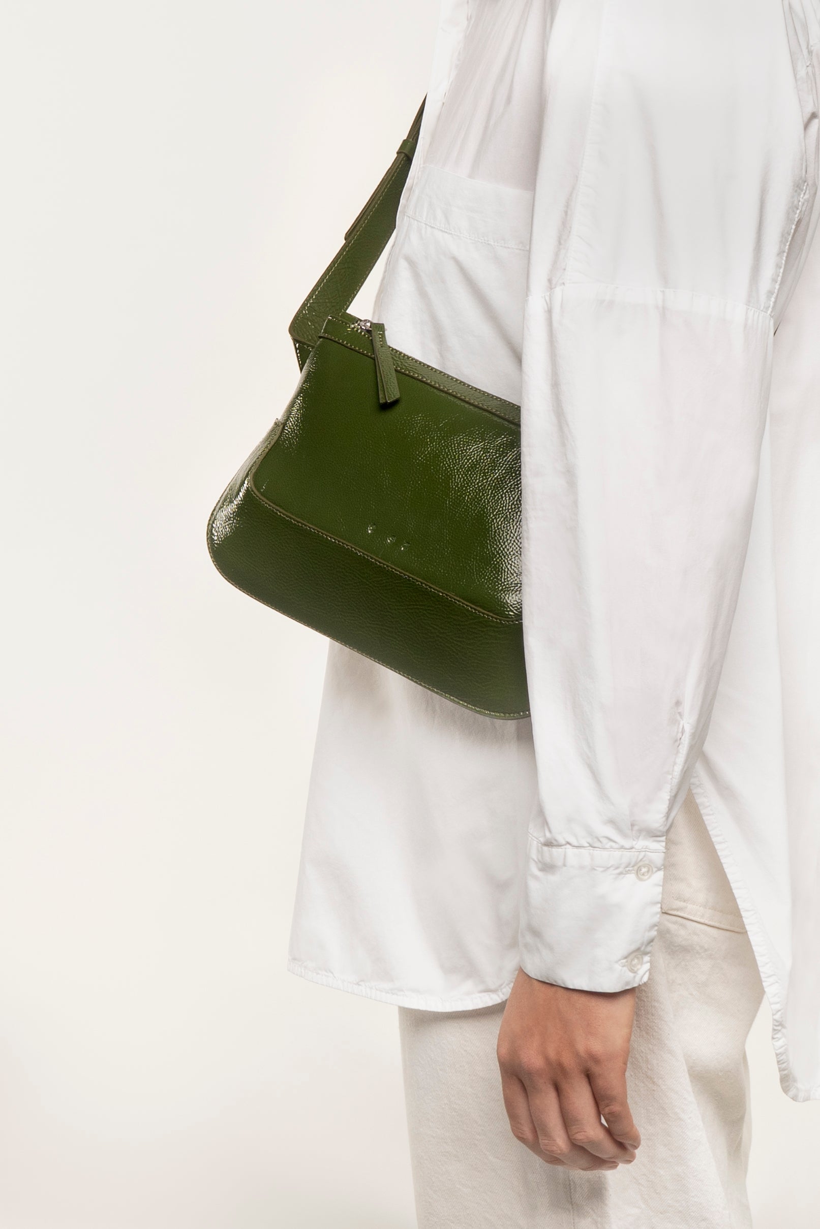 the festival glossy avocado crossbody bag