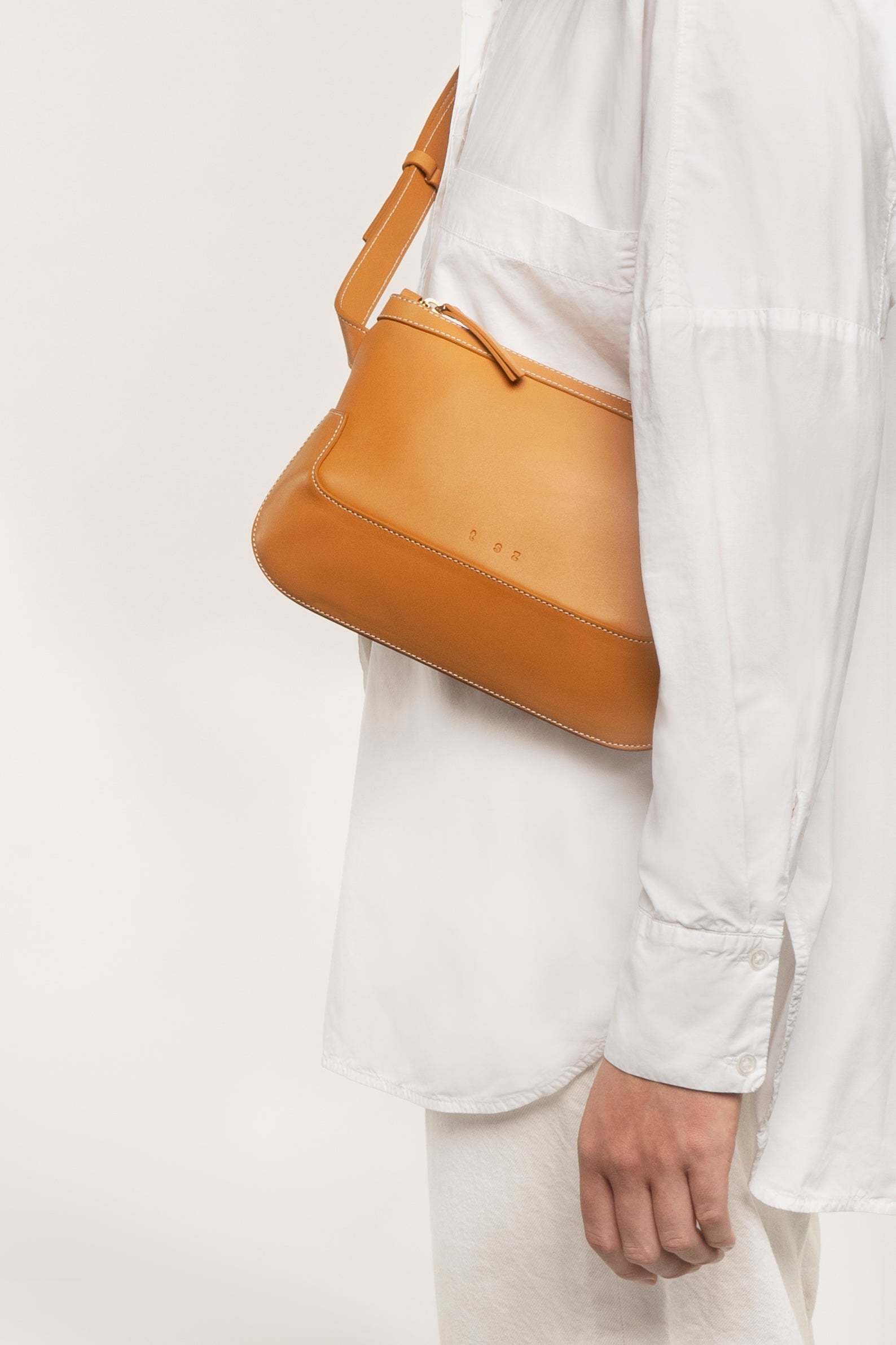 the festival cognac crossbody bag