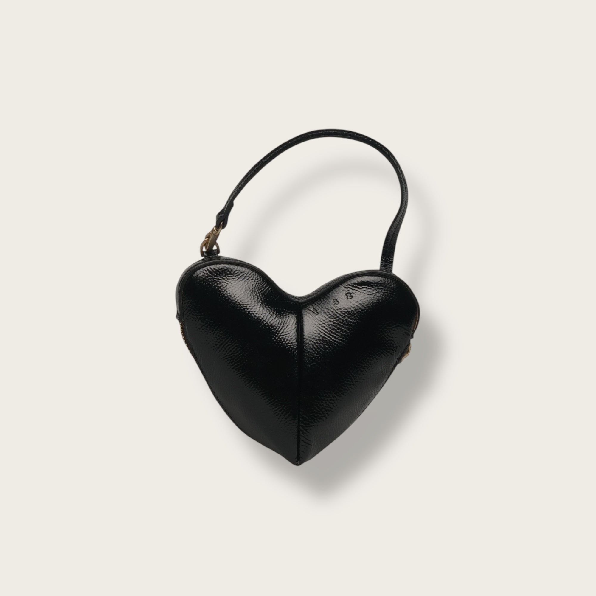 the corazón glossy black pouch