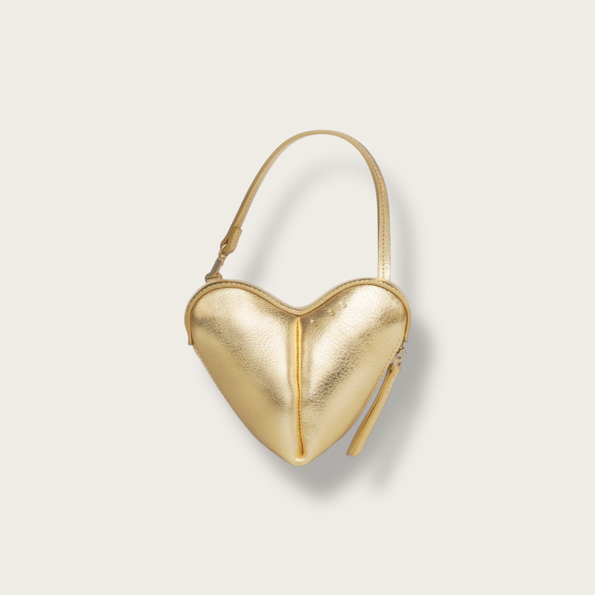 the corazón gold pouch