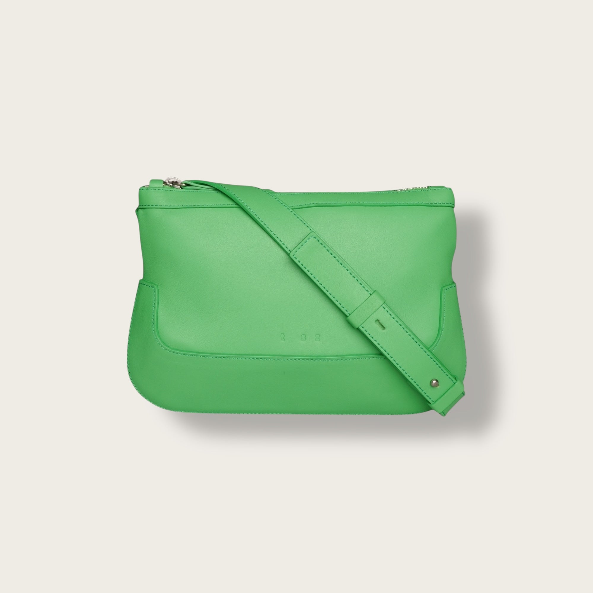 the festival apple green surplus leather crossbody bag
