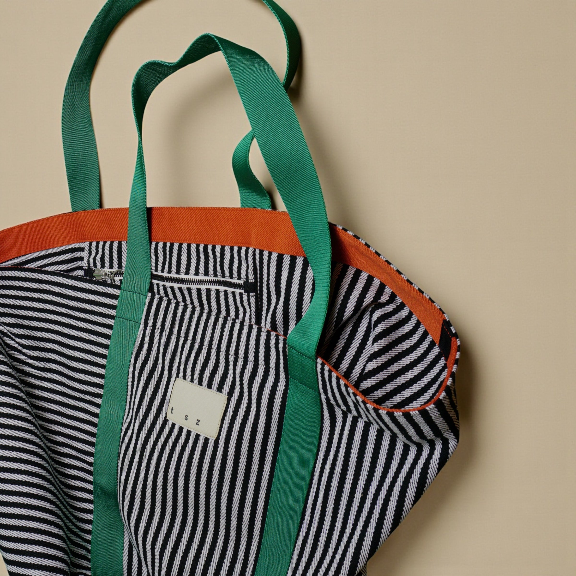 The Sailor black & white striped XL fabric tote bag - green & burnt orange strap detail