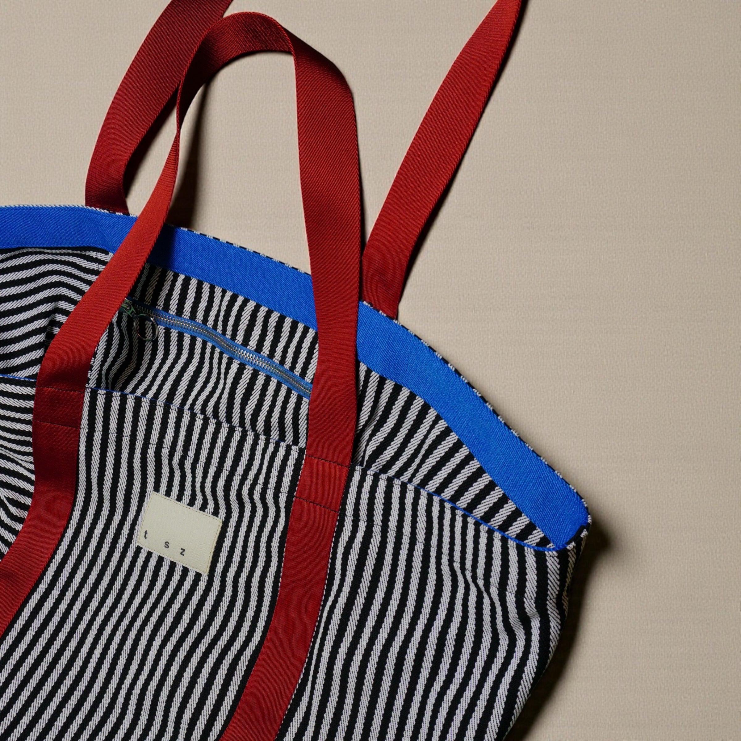 The Sailor black & white striped XL fabric tote bag - burgundy & royal blue strap detail
