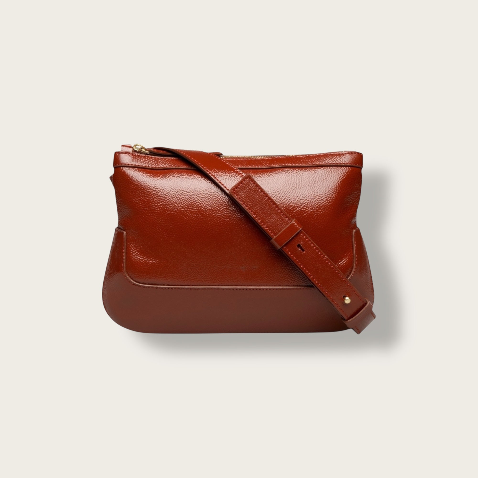 the festival glossy brunette crossbody bag