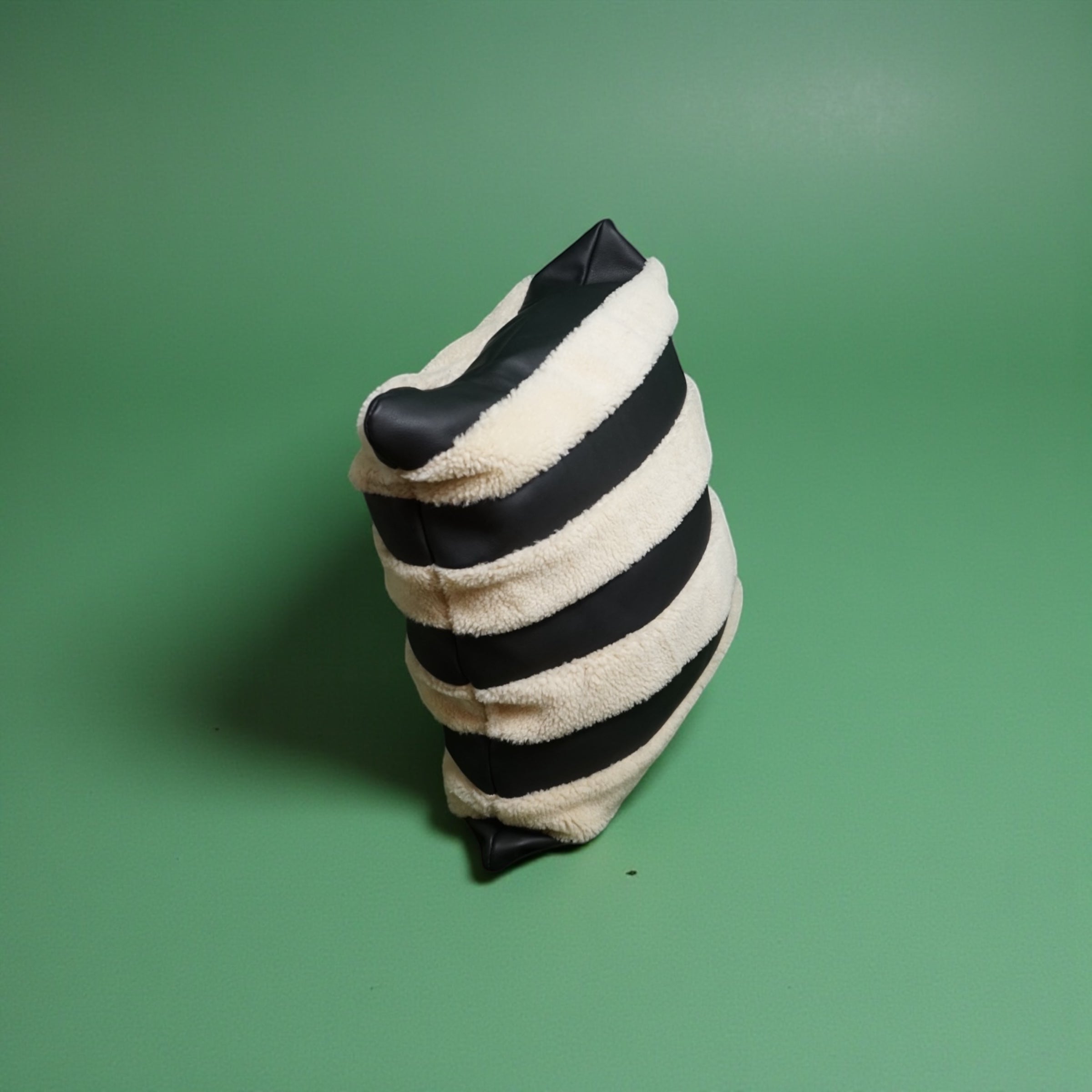 The Marinero black leather and shearling pillow cover