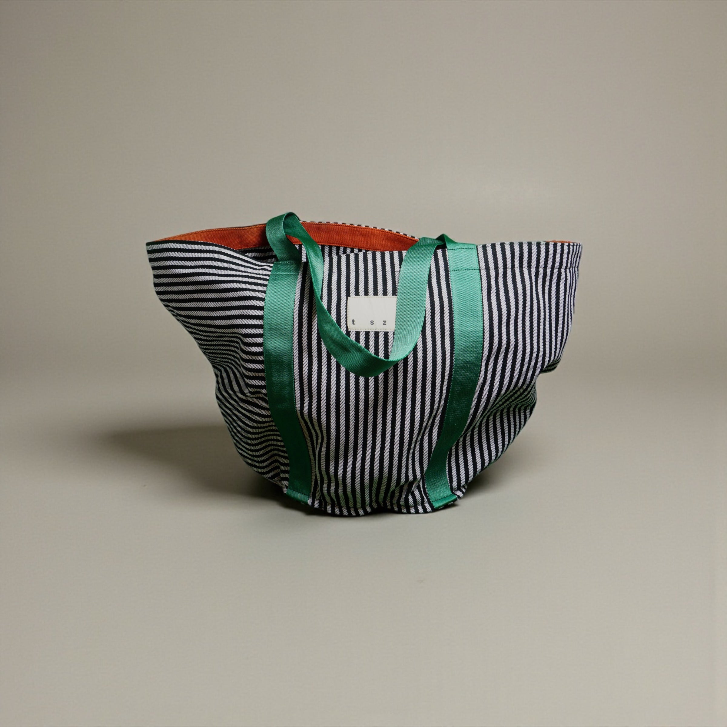 The Sailor black & white striped XL fabric tote bag - green & burnt orange strap detail